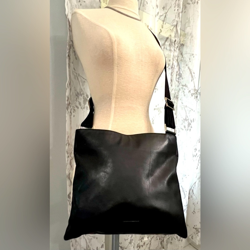 Cole Haan black leather hand bag with ballistic straps and silver hardware
